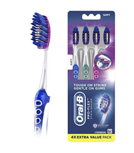 A package of four tooth brushes with different colors.