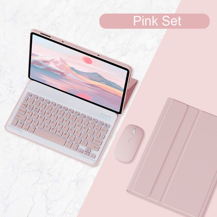 A pink laptop and mouse on the table