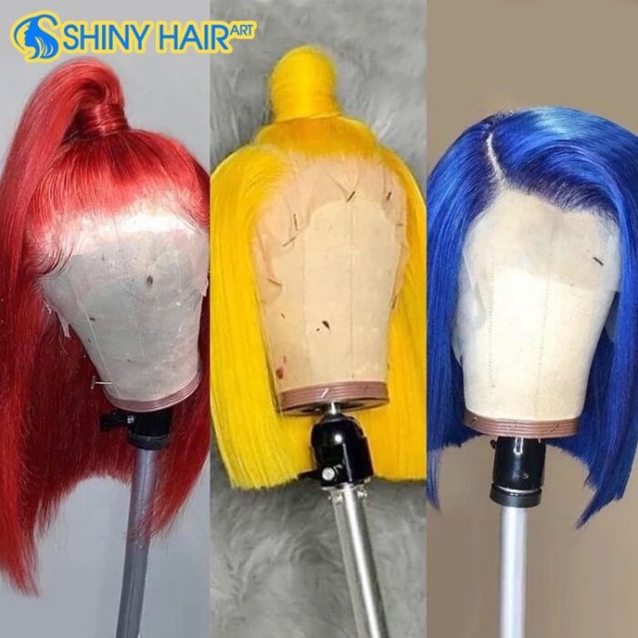 A wig stand with three different colored wigs on it.