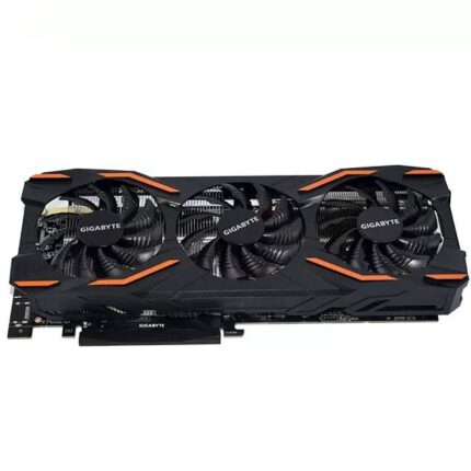 A black and orange video card is on the ground.