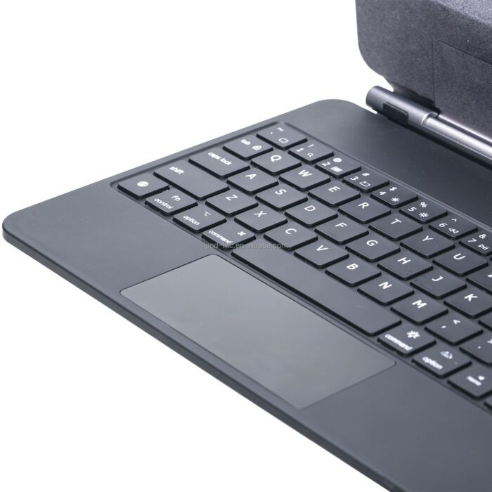 A laptop with keyboard and mouse on top of it.