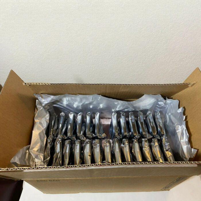 A box of forks in the open.