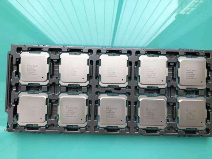 A bunch of computer processors sitting on top of each other.