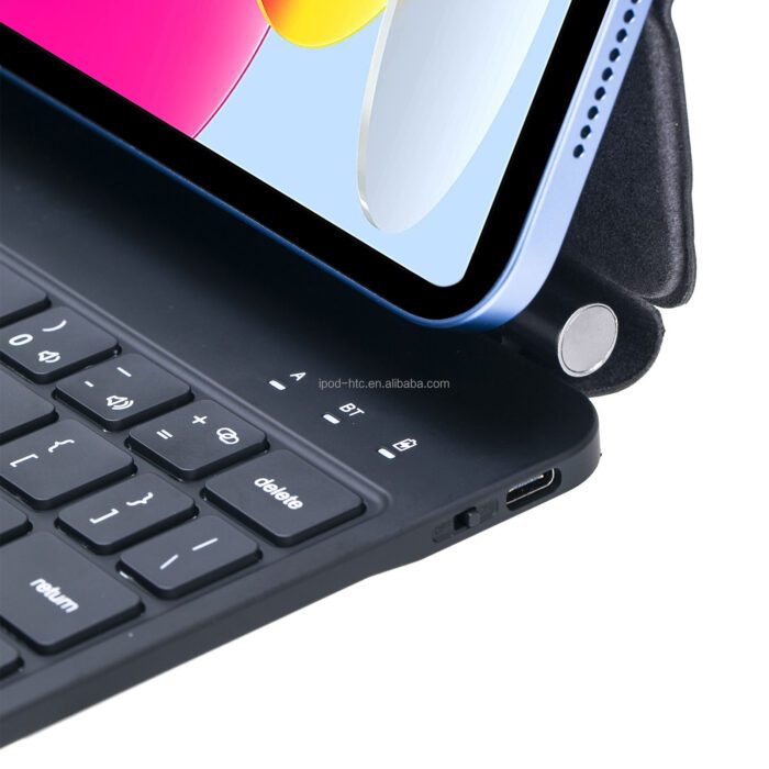 A tablet with a keyboard on top of it.