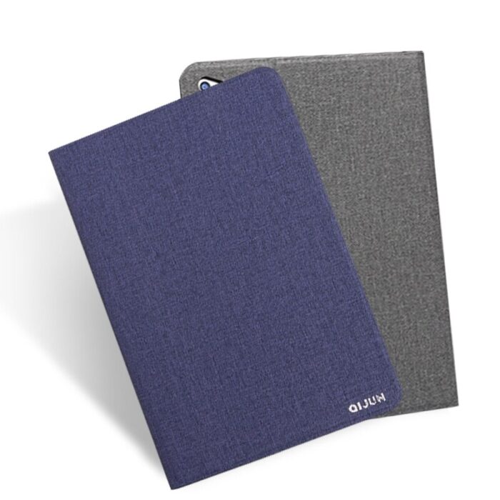 Two notebooks with a blue cover and grey cover.